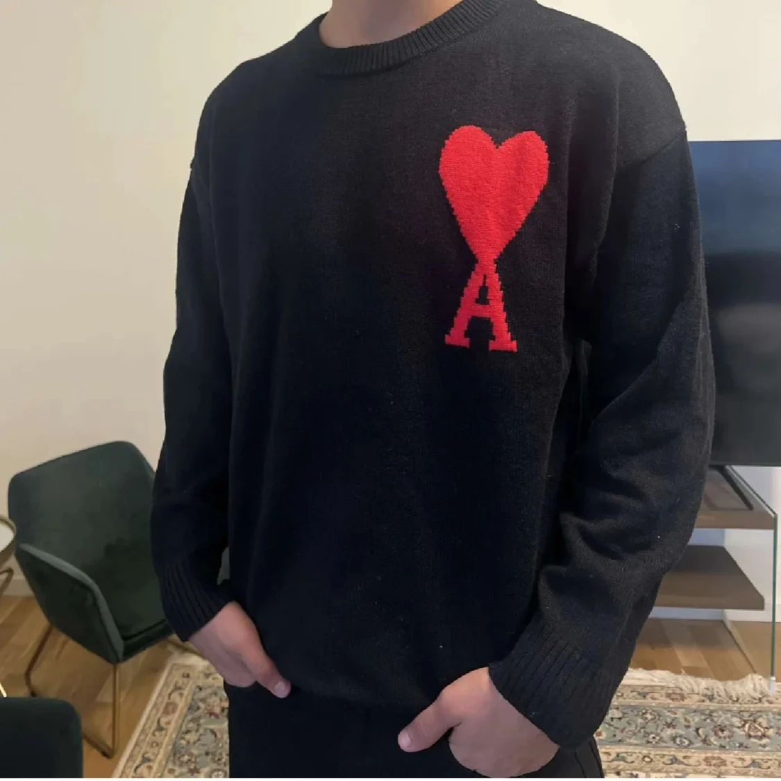 Ami Paris stickad tröja med rött hjärta