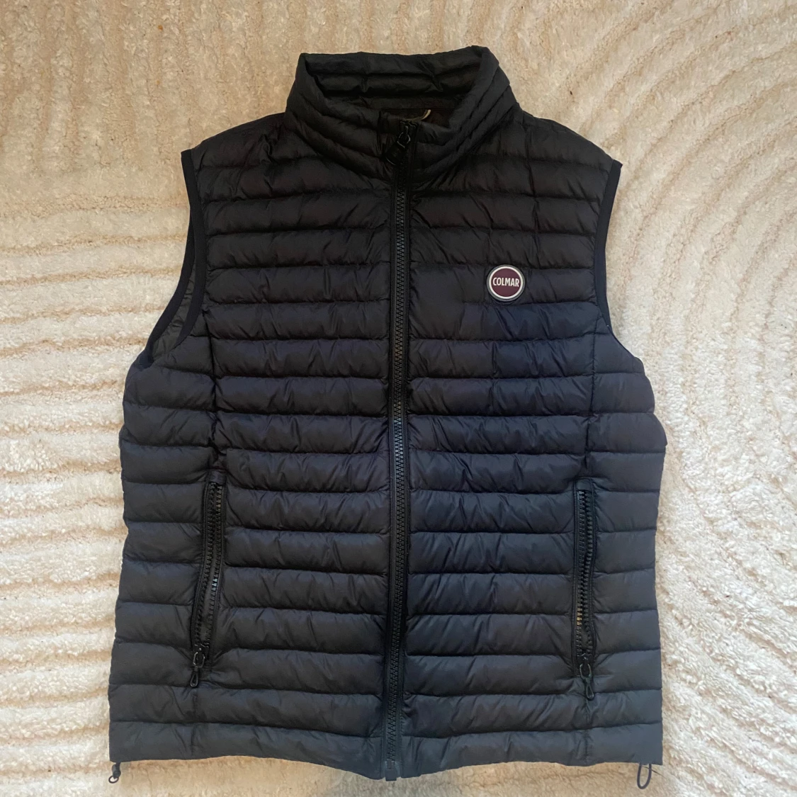 Svart dunväst från Colmar, strl 50