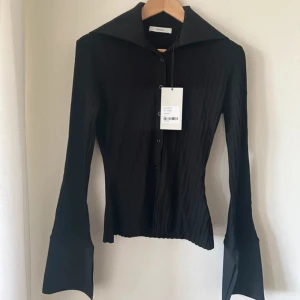 Paloma topp Avora  - Svart Paloma topp från Avora i nyskick, storlek S. nypris 1500:-. Finns inte längre att köpa på hemsidan 🩷