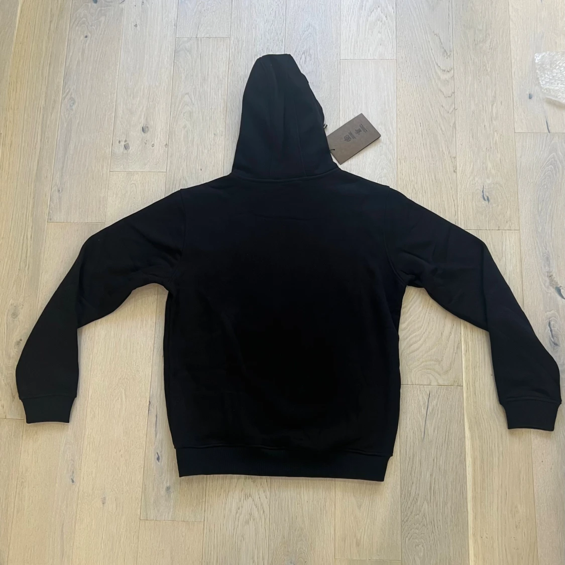 Svart Burberry hoodie med rutig huva - 1