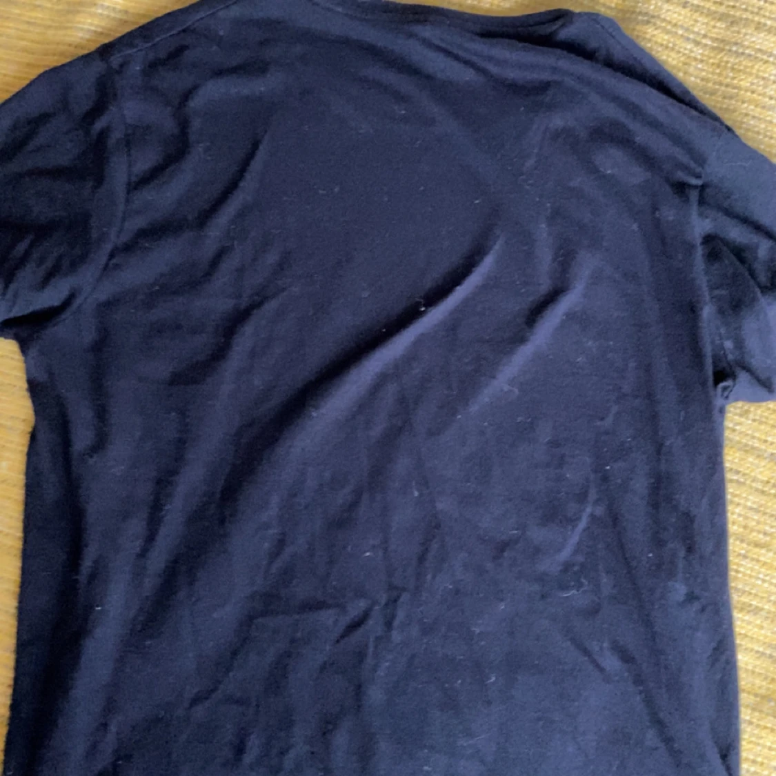 Svart t-shirt med Balmain-tryck - 1