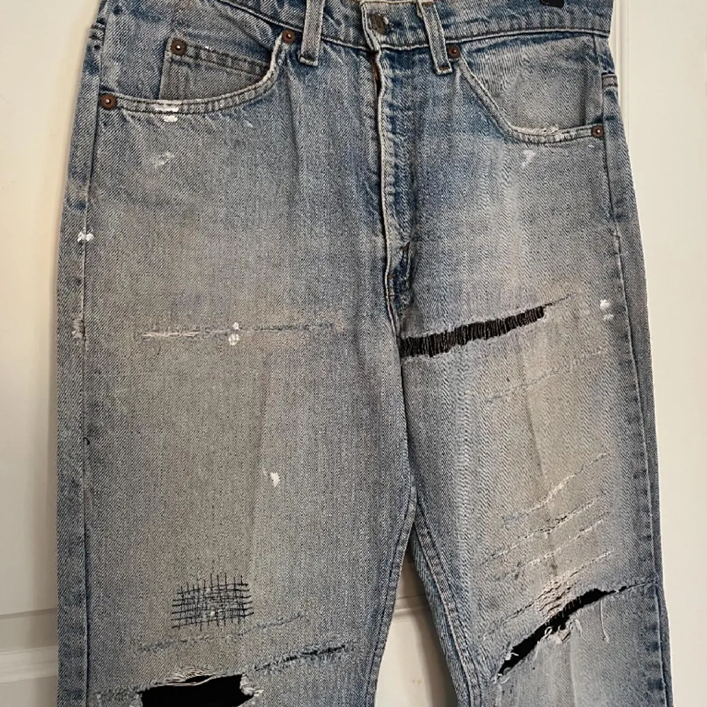 Professionally repaired pair of orangetab Levi’s 505’s from the 70’s. Fits 30x32.. Jeans & Byxor.