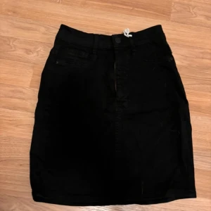 Jeanskjol - Oanvänd från Gina