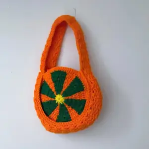 Orange crocheted bag 