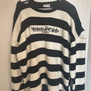 Maison Margiela X Tommy Cash Sweater - Baggy fit with the iconic holes around collar and arm, worn once so great condition!  
