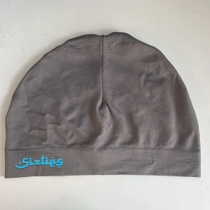 Sixties mössa - Det är den nya blå/gråa Sixties mössan helt ny.