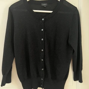 Glittrig kofta Lindex  - Som ny 