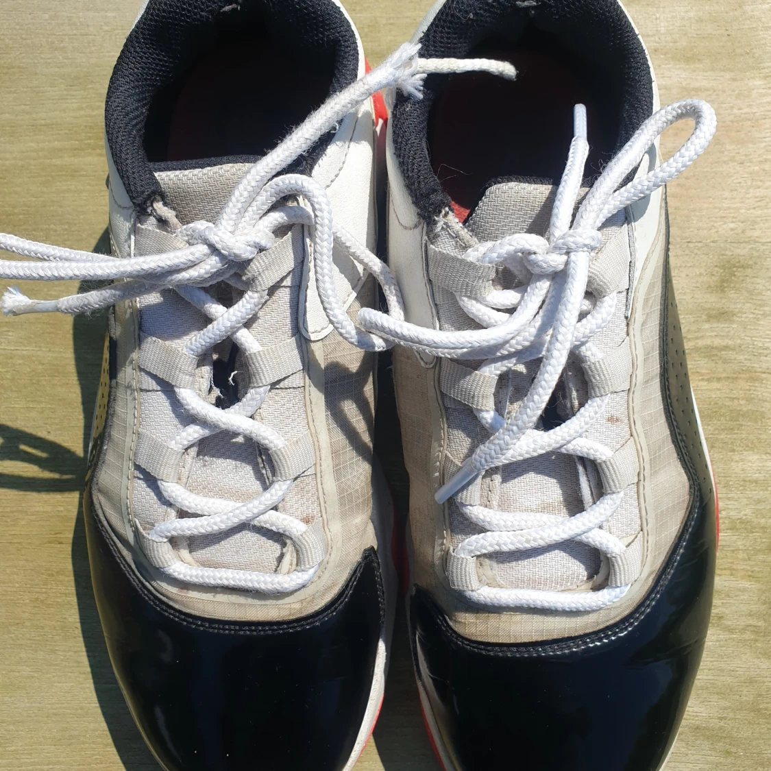 Jordan 11 CMFT Low Concord-Bred