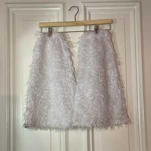 Päls benvärmare  - Jättesöta utsvängda benvärmare 