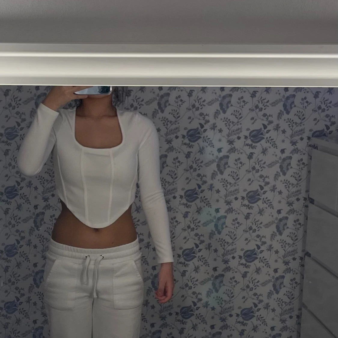 Petite långärmad topp