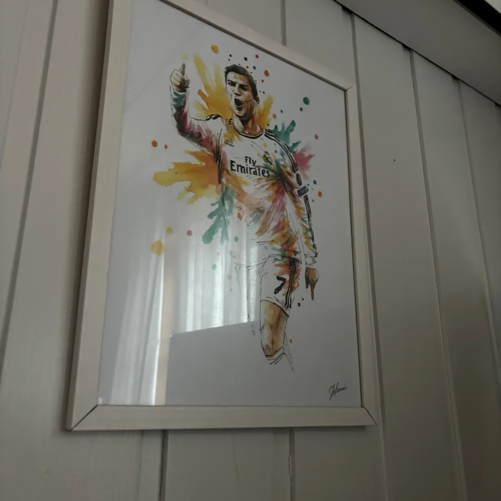 Ronaldo-tavla av Nazar Stefanovic (ramen ingår). Skick: som ny. Storlek 40cm x 35cm. Övrigt.