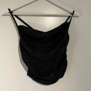 Glitterlinne  - Aldrig använt, glittrigt linne som inte strösslar av sig, jätte fint till fest, strl xs