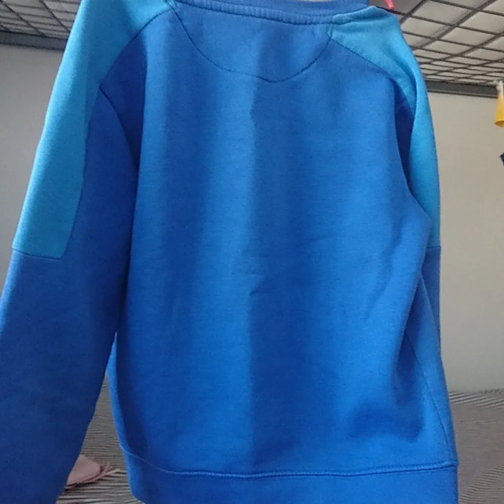 It is a little used now but is for boys of age 8 or 9. It is just for boys. It is a foreign country sweatshirt. Prices can be lower if interested. Hoodies.