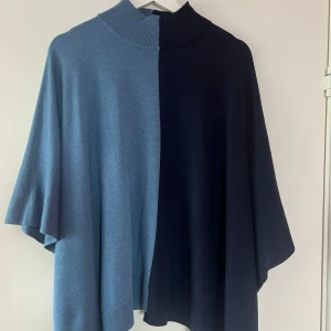 Poncho  - Jättefin tröja, använd 1 gång och inga defekter. 