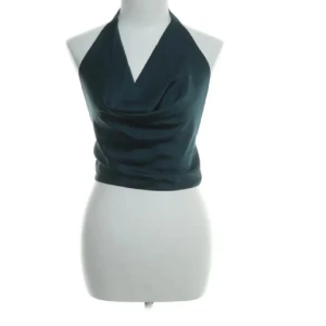 Halter neck topp - Halter neck top grön Köpte 2, glömt att lämna tillbaka denna, prislapp finns kvar.  (Ångrade mitt köp på Sellpy, därav bilden)