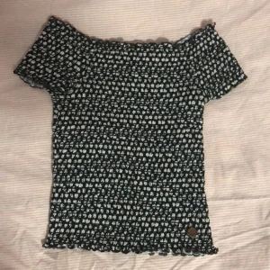 Black shirt with white flowers 🌸  - Soft and stretchy bought for 170 kr.