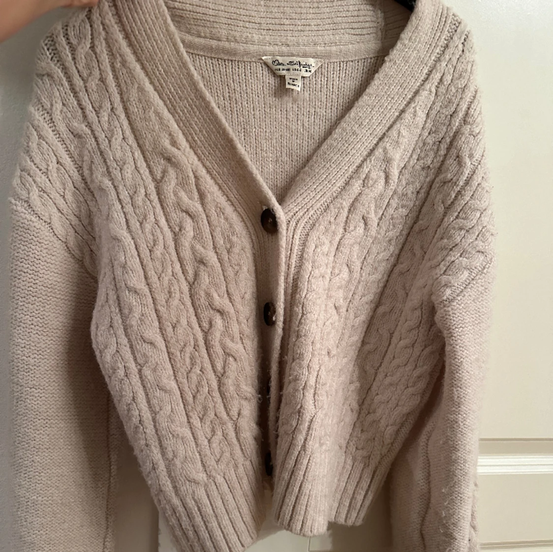 Kabelstickad mysig kofta