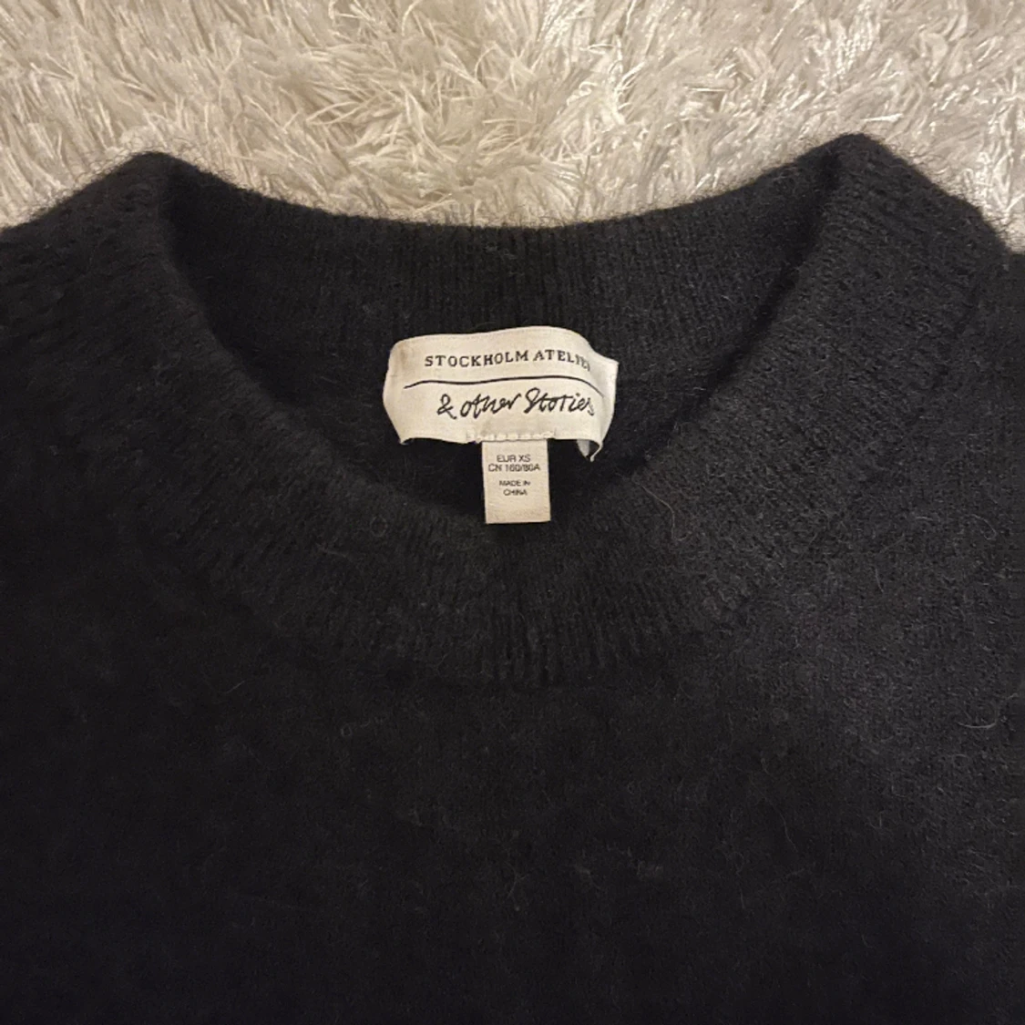 Svart stickad tröja  - 90