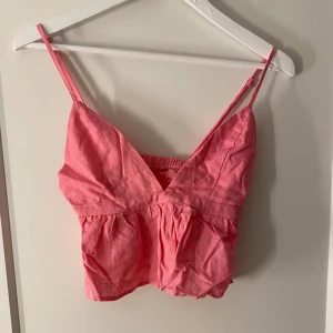 Rosa topp - Säljer denna snygga topp som endast är provad. Priset går att diskutera
