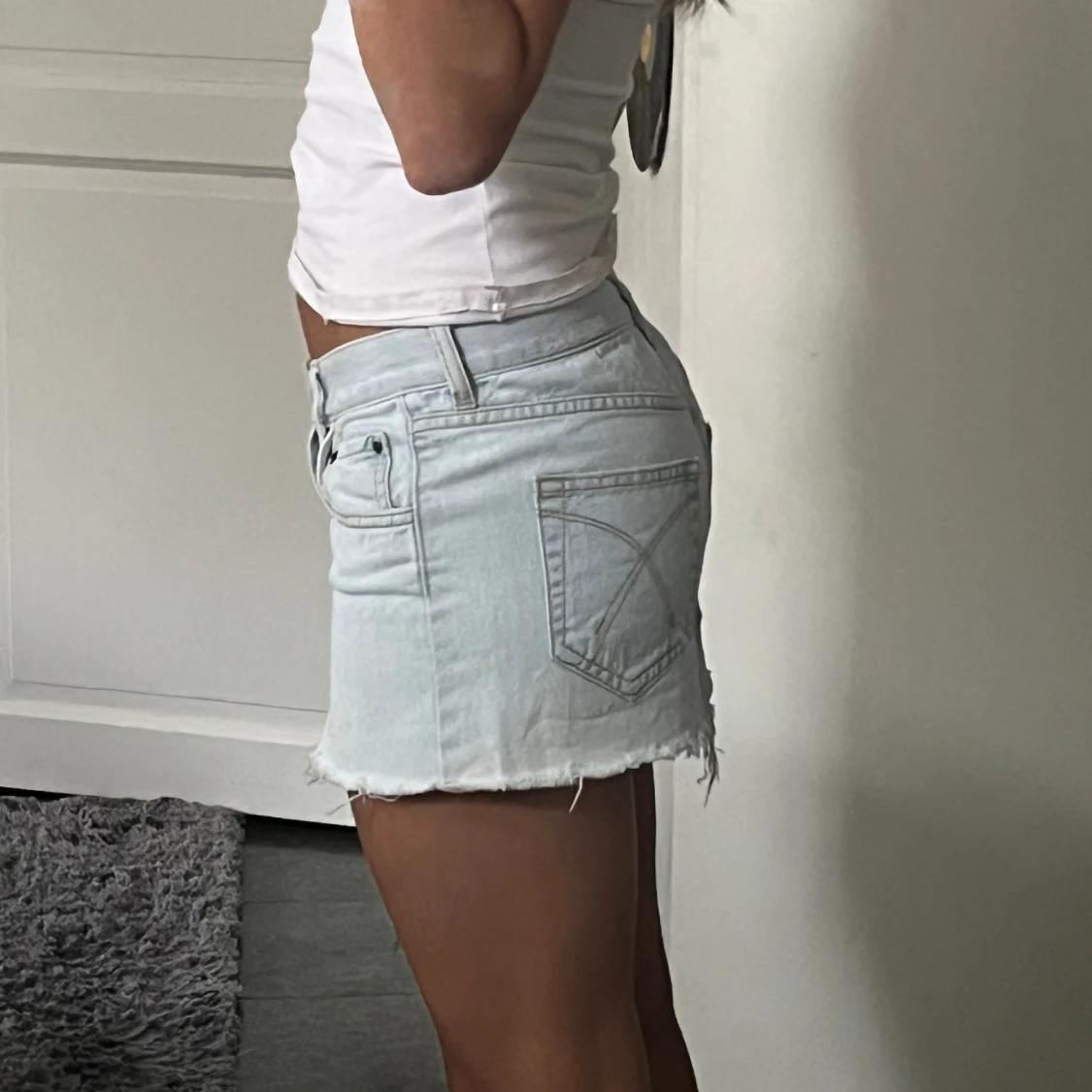 Ljus jeanskjol lågmidjad  - 91