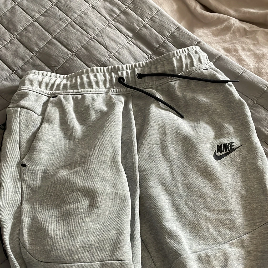 Nike tech byxor - 90