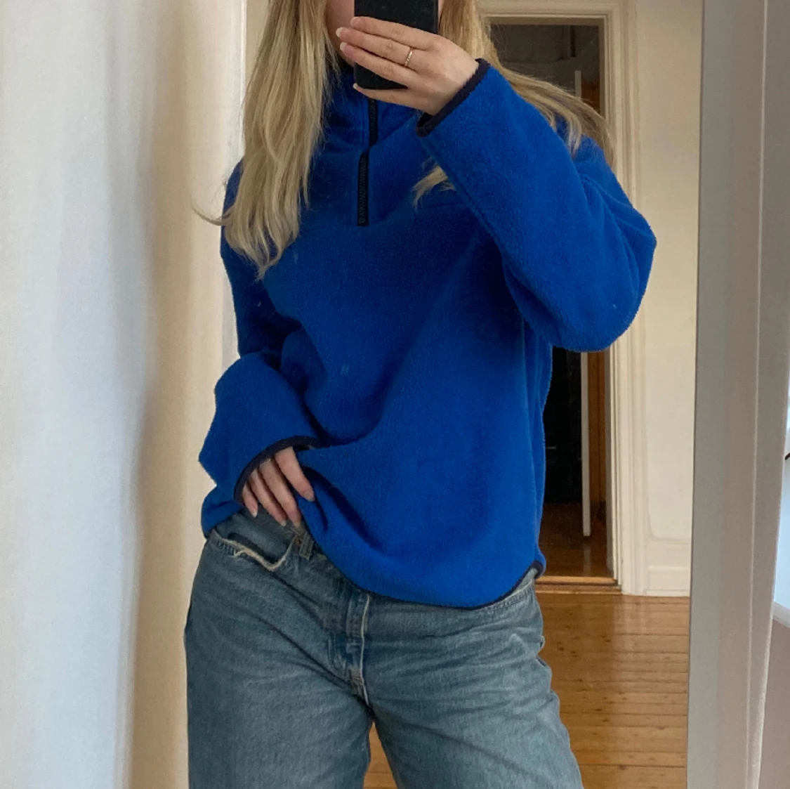 Blå fleece halv-zip