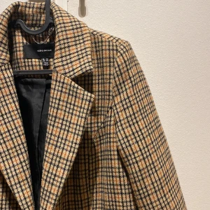 Rutig kappa  - As snygg Kappa från Vero Moda 