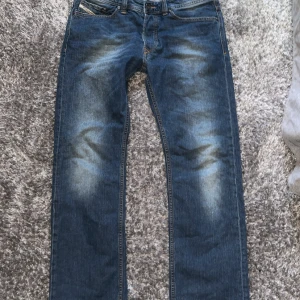 Diseal jeans  - Slightly baggy jeans if your a short  dude (under 175) like me but they are straight fit and there good quality and no holes or stains 