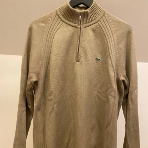 Lacoste halfzip - Skicka för frågor