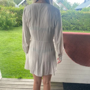 Sommarklänning - En kort sommarklänning som inte blir Andvändarnamn tyvärr 