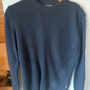 Lindbergh - Stickad tröja från Lindbergh i ny skick 