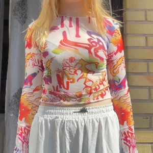 Mesh tröja  - Mesh tröja med olika motiv 