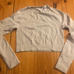 Tränings topp - En tränings topp har aldrig använt har en lite fläk. 