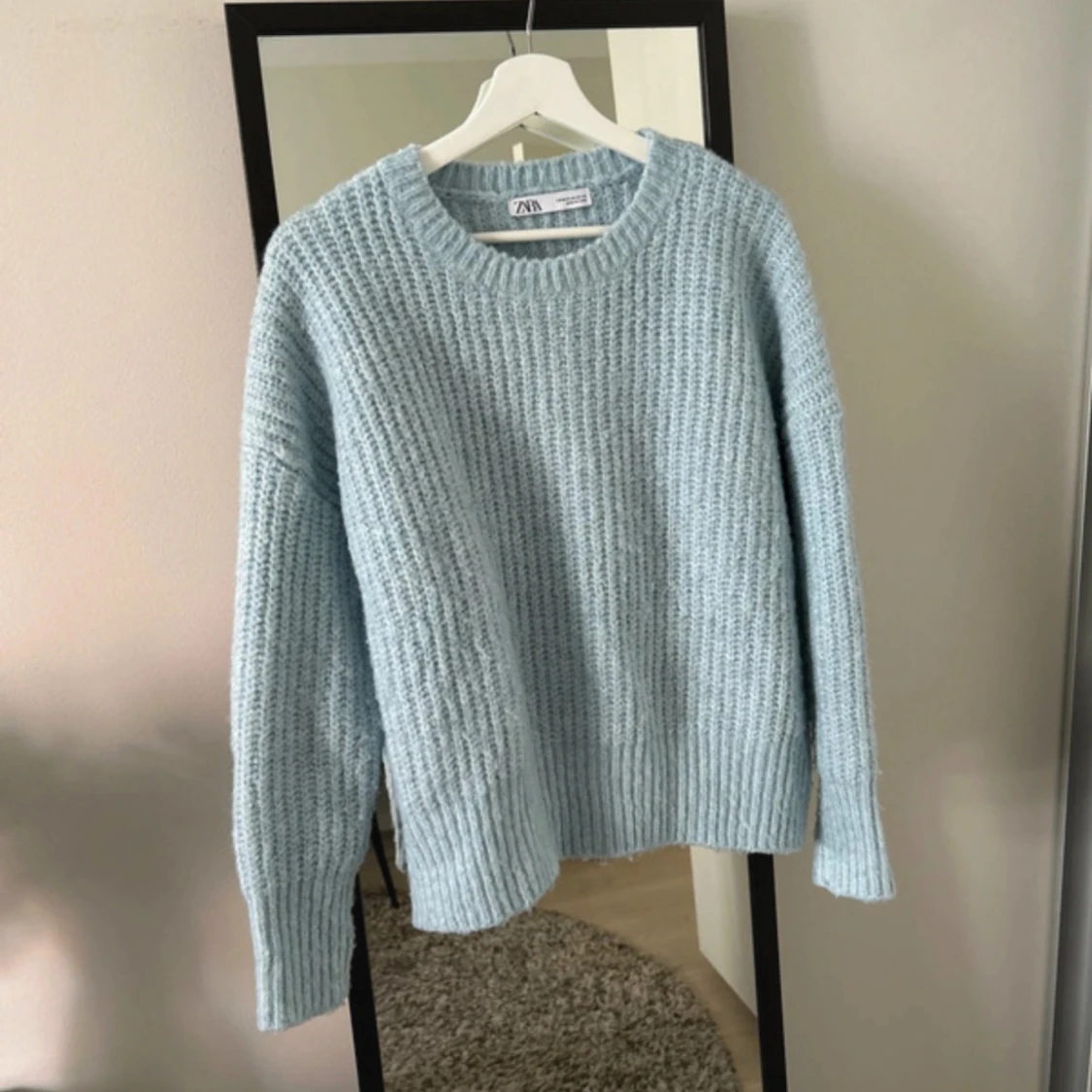 Turkos stickad tröja