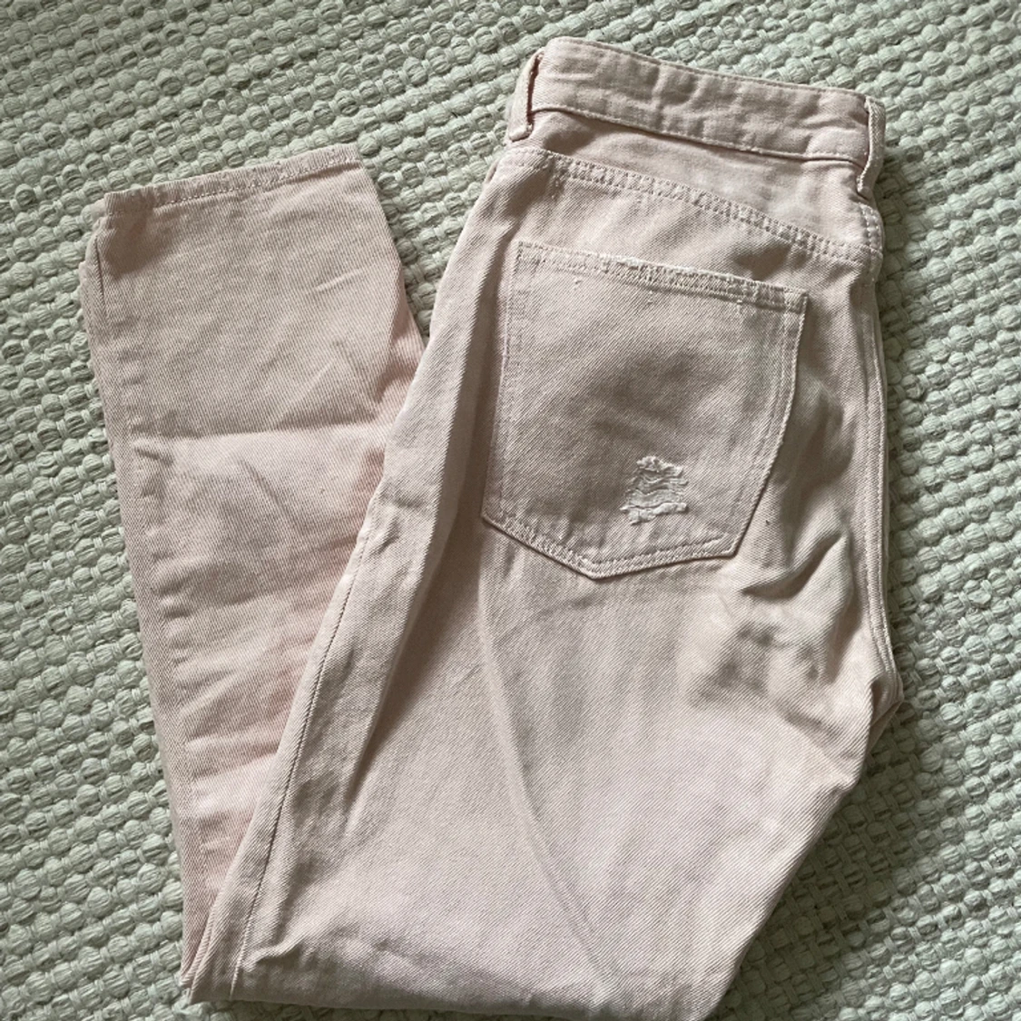 Ljusrosa jeans