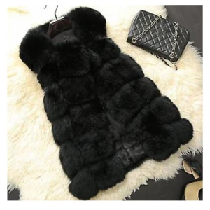 Päls väst  - Inte äkta päls. Bra skick, s eller xs .