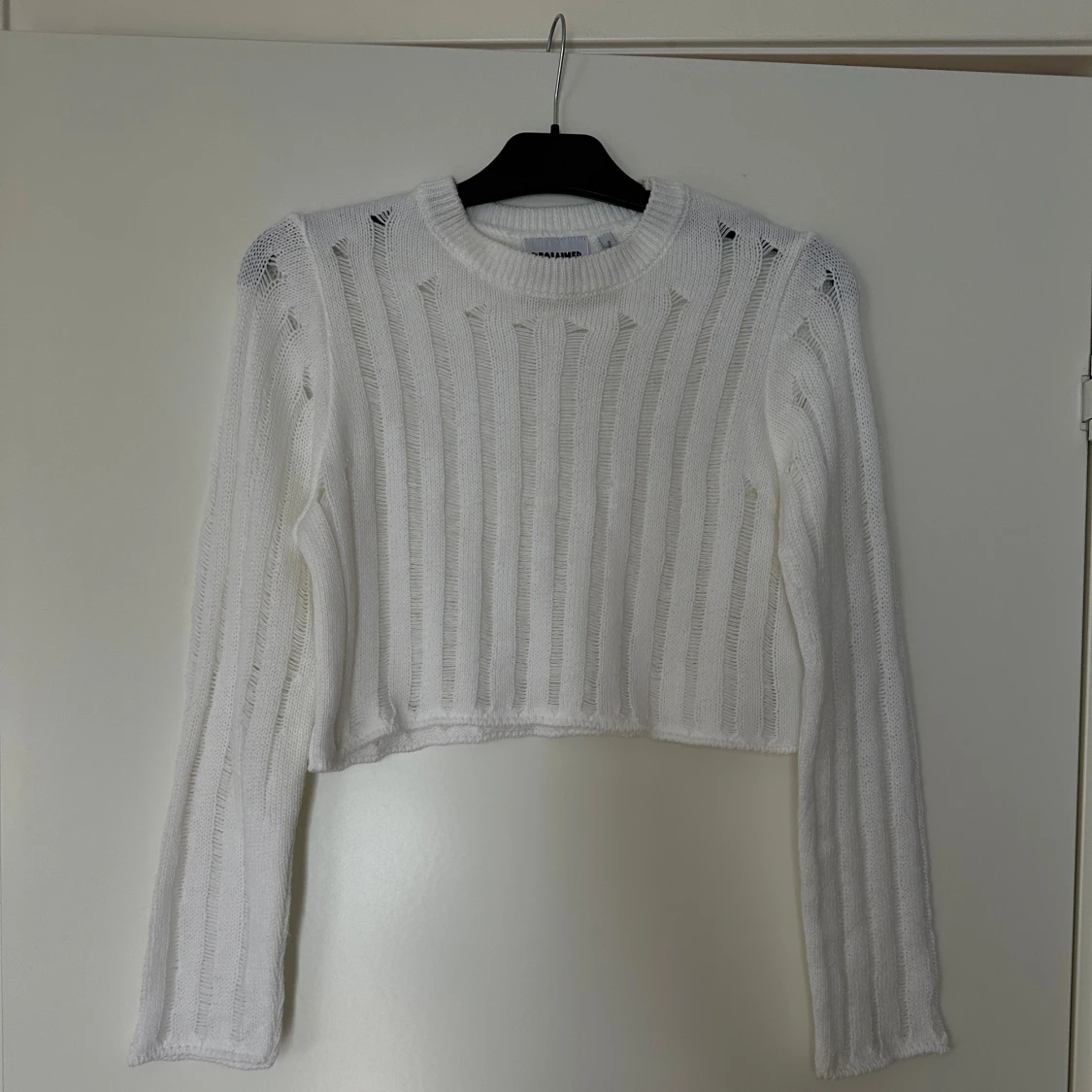 Distressed stickad tröja