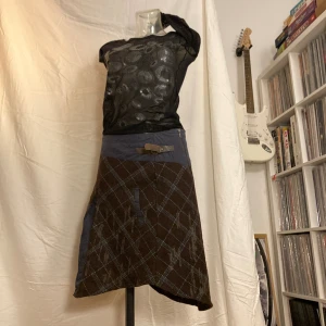 Kjol - Rutig kjol storlel M.  