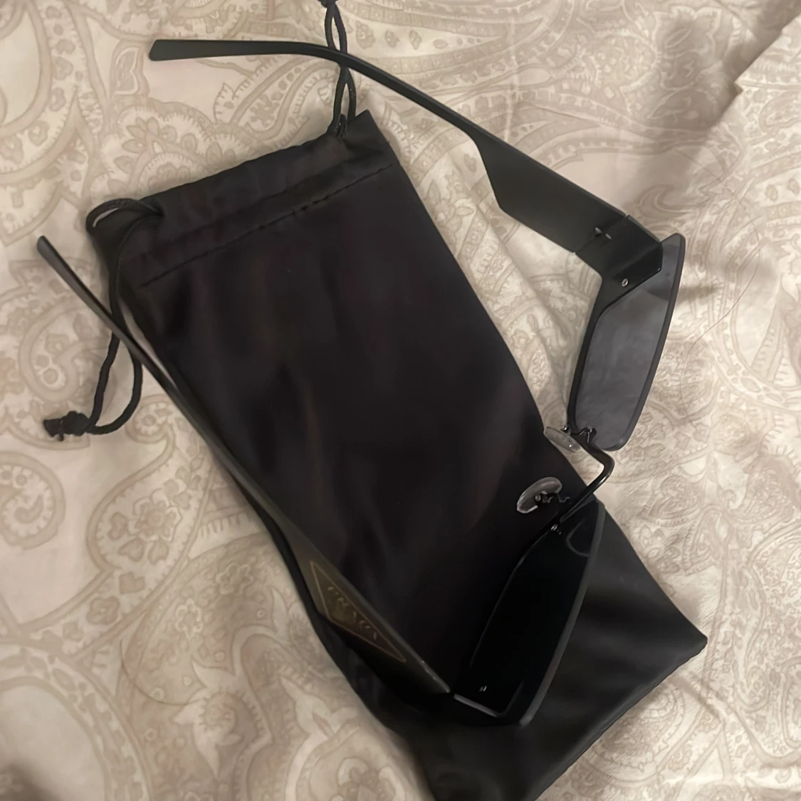 PRADA SOLGLASÖGON - 91