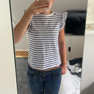 randig topp - kommer inte till användning 