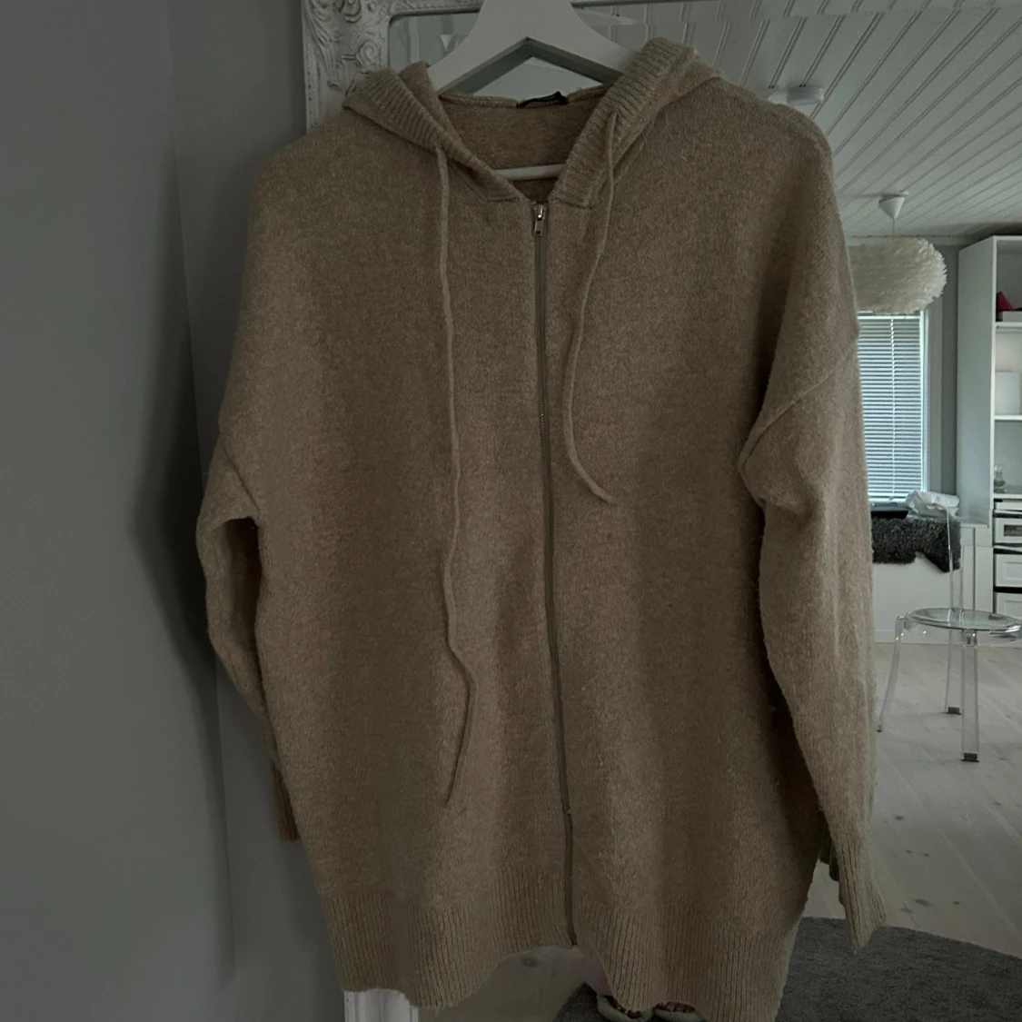 Stickad zip-up tröja