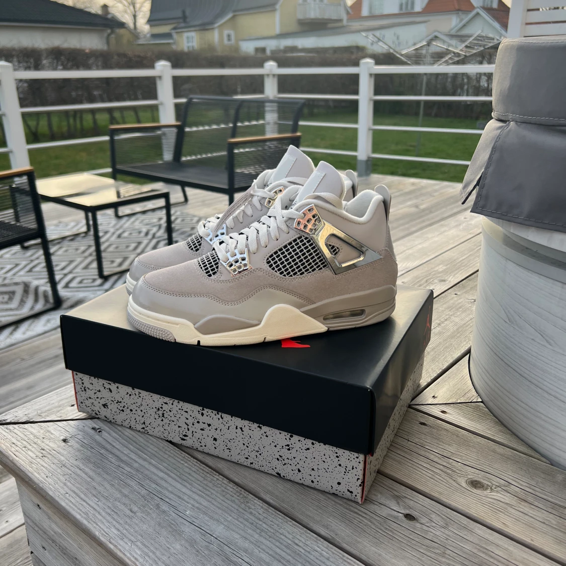 Jordan 4 Frozen Moments 