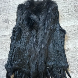 Päls väst  - Oanvänd storlek S-M 