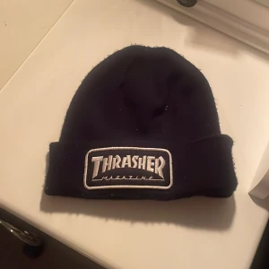 Thrasher Magazine - Mössa  - Mössan i gott skick, använt den någon enstaka gång. Inte för tjock, sitter skönt på skallen (: