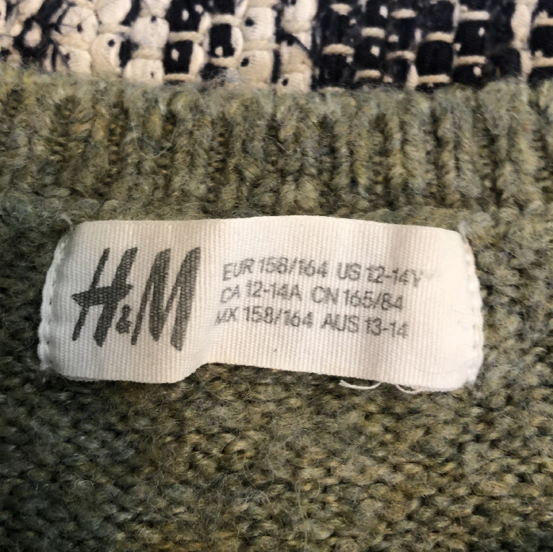 Fin långärmad stickad tröja - 90