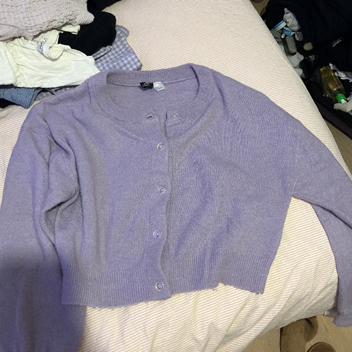 Lila stickad tröja  - 90