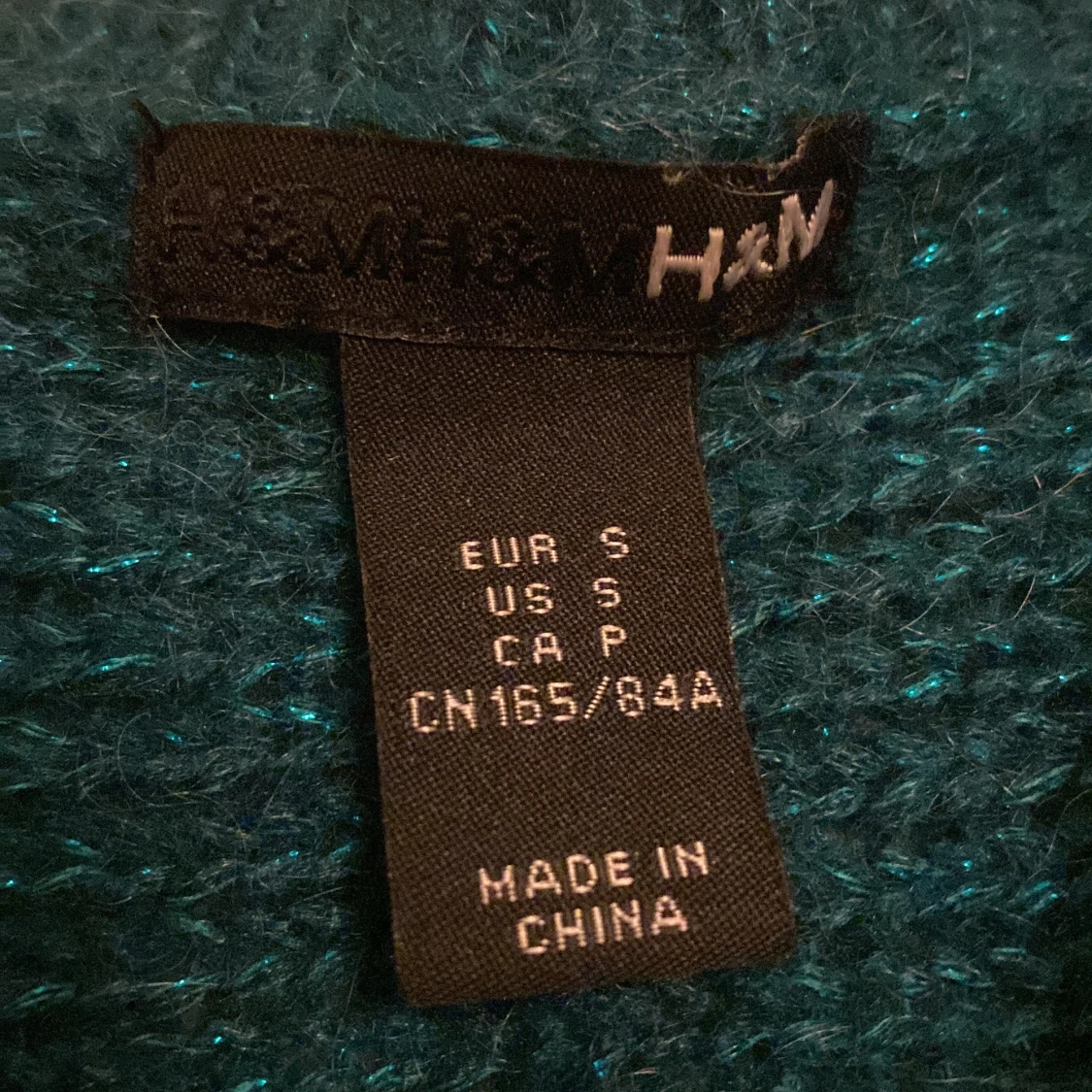 Glittrig kofta från H&M - 1