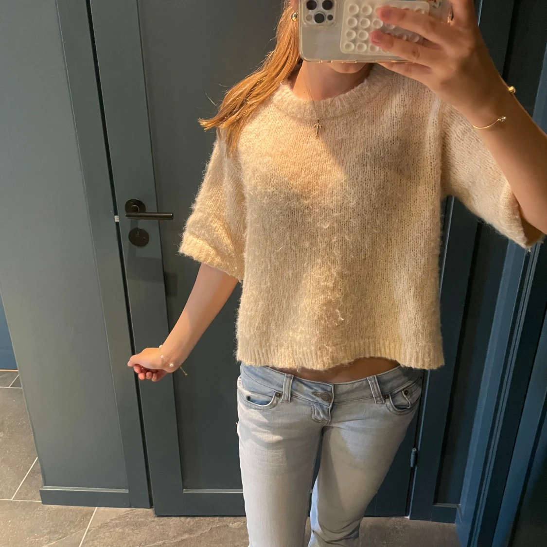 Beige stickad kortärmad tröja