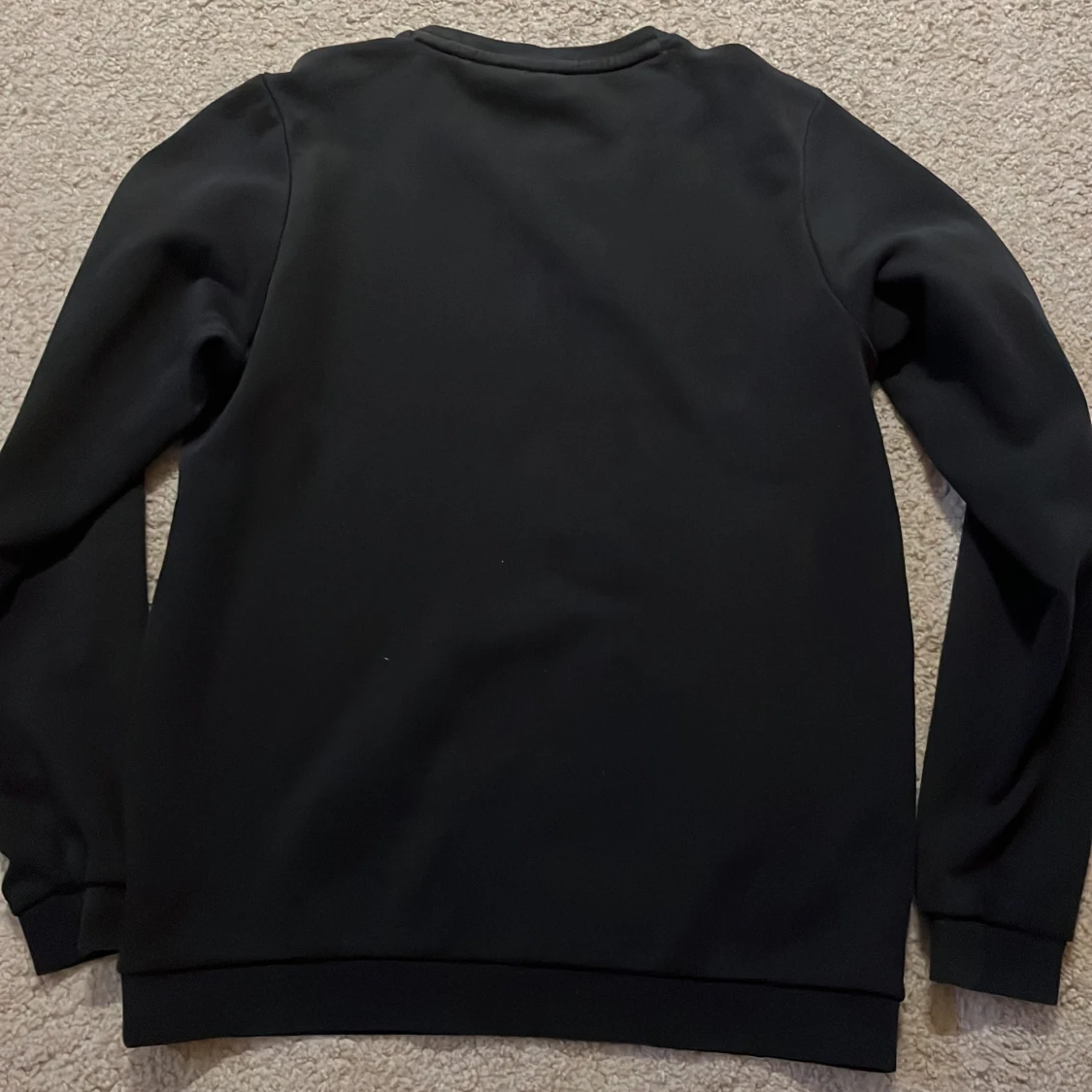 Svart sweatshirt från Sail Racing - 1