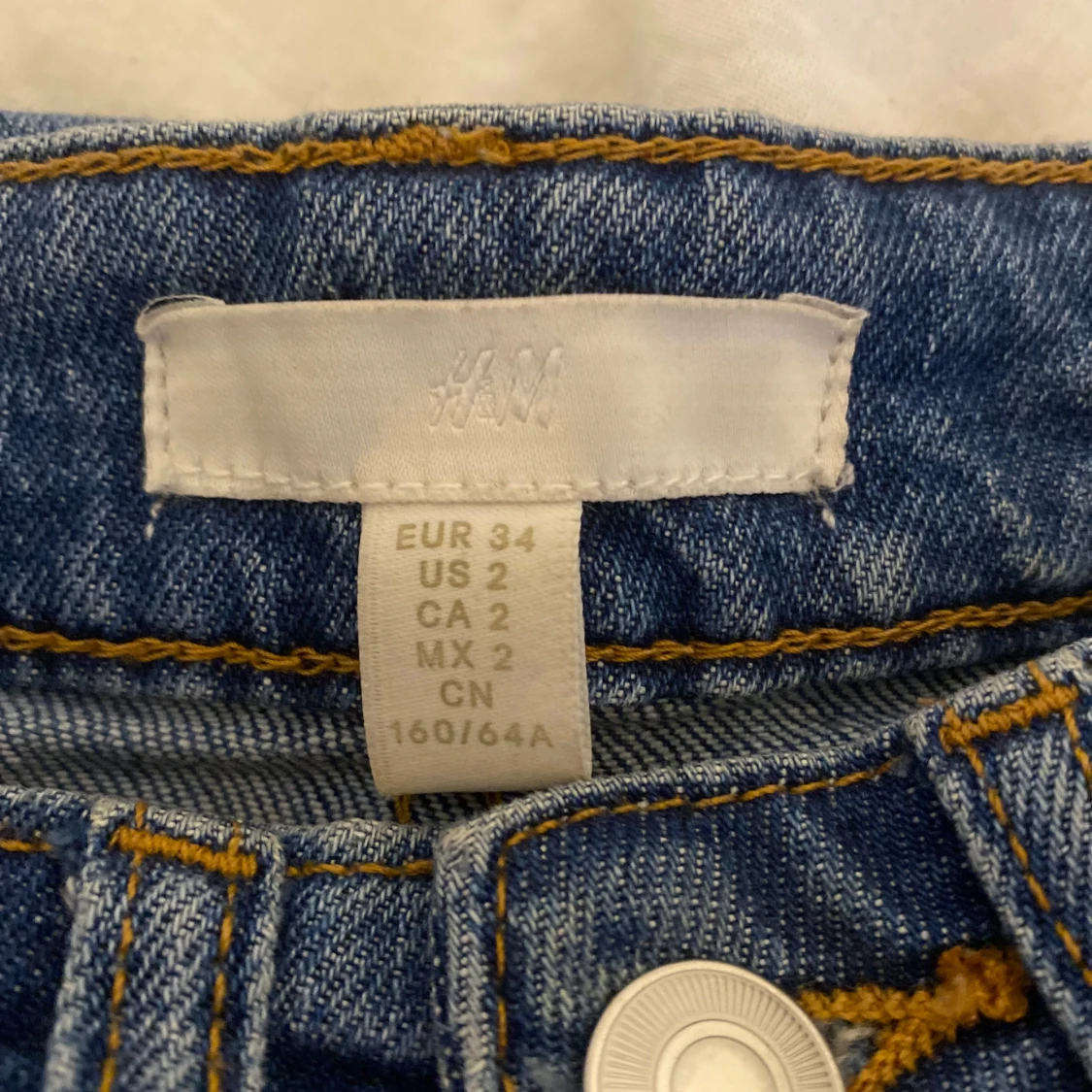 Blå bootcut jeans från H&M, stl 34 - 2